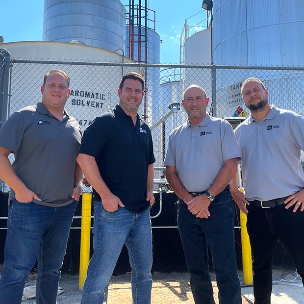 United-Asphalt-Owners-in-Front-of-Asphalt-Tank-Farm United Asphalt Owners in Front of Asphalt Tank Farm